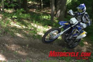 The Husaberg is heavy, but it feels surprisingly agile in the woods.