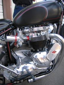 The Kane built Bonneville motor features a classic ARD magneto and true-to-old-school Amal carbs with a glimpse of the hand-formed, finned oil tank and “we don’t need no stinkin’ mufflers” exhaust system.