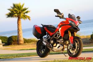 The Multistrada S Sport comes only with carbon-fiber bodywork replacement pieces as part of its upscale treatment. The 31-27 liter capacity hardbags are an $849 extra. Larger saddlebags with 39-34 liter capacity are available for $999.  However, the identically priced S Touring model has the lesser capacity bags, centerstand and heated grips as standard.