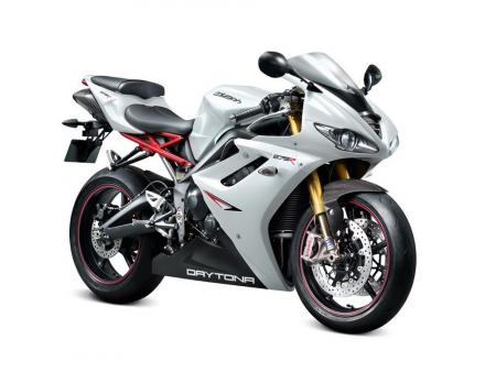 The red subframe stands out against the new white and black paint on the Triumph Daytona 675R.
