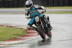 Racing Electric Motorcycles Cornering in the Rain