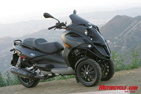 The Piaggio MP3 500’s styling is a cross between a grasshopper and a Transformer.