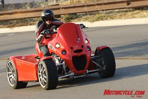 Part motorcycle, part car and part snowmobile, the Quadster gets through corners in a style all its own.