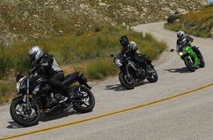 The  Versys is led by the ER-6n and followed by the Ninja 650R. Don’t let the  green bike’s racer looks deceive you. The Ninja has nothing on the  Versys when the roads get twisty.