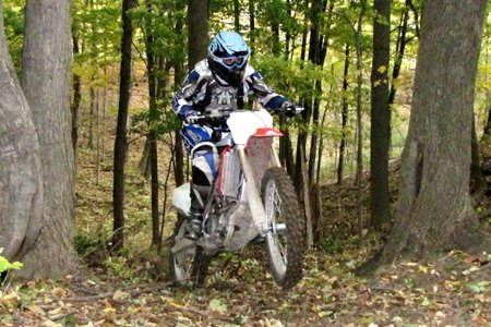 Sometimes a good bike is a good bike, no matter where you ride it. The CRF250R rages in the woods right out of the box. With a few simple mods it would make an excellent hare scramble machine!