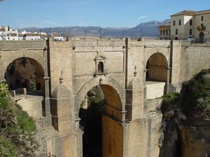 This bridge connects the two halves of Ronda which are split by the 330' deep El Tajo gorge... Probably NOT a good place for a highside.