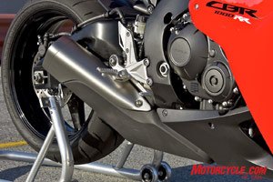 Honda abandoned the old CBR’s “Center Up” undertail exhaust in favor of this bulky unit under and behind the engine. It’s the shape of things to come.