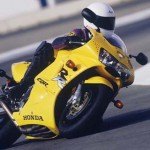 1998 Honda CBR900RR Yellow action 2