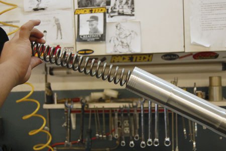 Race Tech replaces the OEM fork spring with one of its units with the appropriate rate to handle the weight of the rider and the machine. (Photo courtesy of Race Tech)