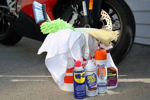 Cleaning potentially corrosive road dirt and bugs, then waxing and polishing the bike are a good idea before stowing it away for months at a time.