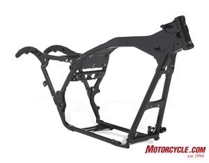 The new touring frame is welded robotically and is constructed of various investment cast, forged and stamped pieces. Total parts count for the new chassis numbers 40 pieces, a big reduction from the 90 pieces that made up the previous frame.