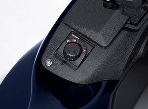 Yep, Grip Warmer says it all. Just above the grip warmer dial is the new storage compartment.