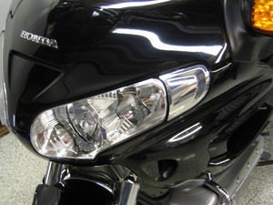 Note how the fairing air vents, at the outer edges of the headlights, have been eliminated.