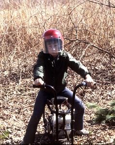  If only I still had that helmet, pull start, and paddle-on-tire brake system...