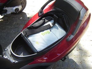 Can your GSXR-1000 fit a laptop under the seat? Huh? Can it?
