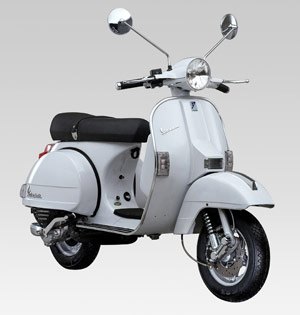 First appearing in October, 1977, the Vespa PX has a four-speed manual transmission with a handlebar shifter.